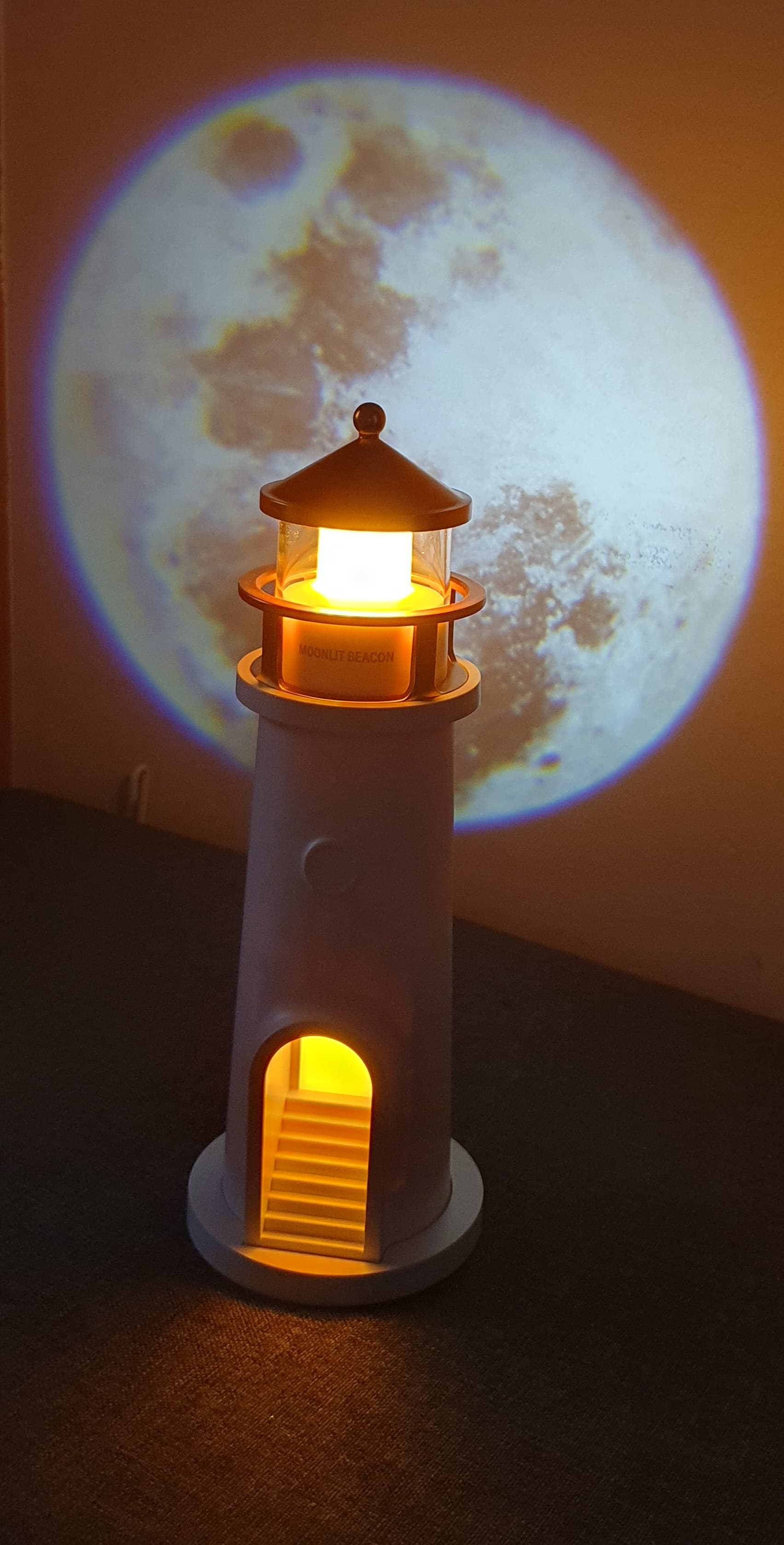 Lampka nocna Latarnia morska z projekcją księżyca
