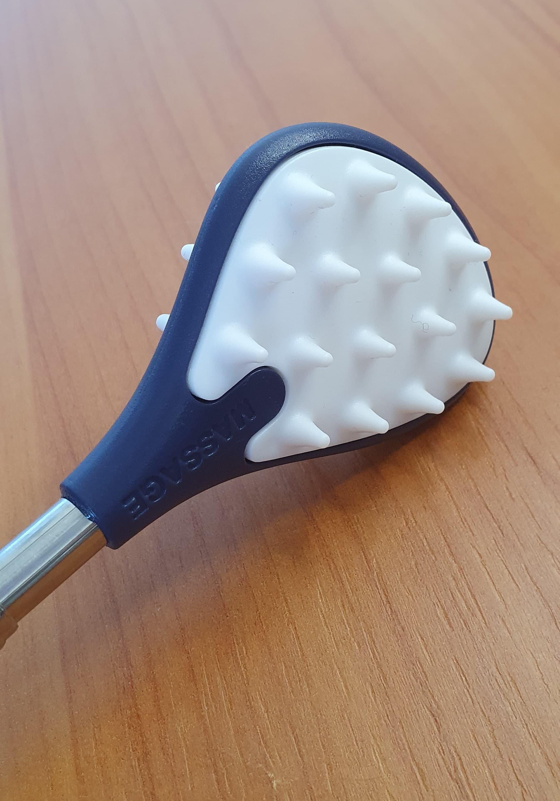 Teleskopowy drapak do pleców