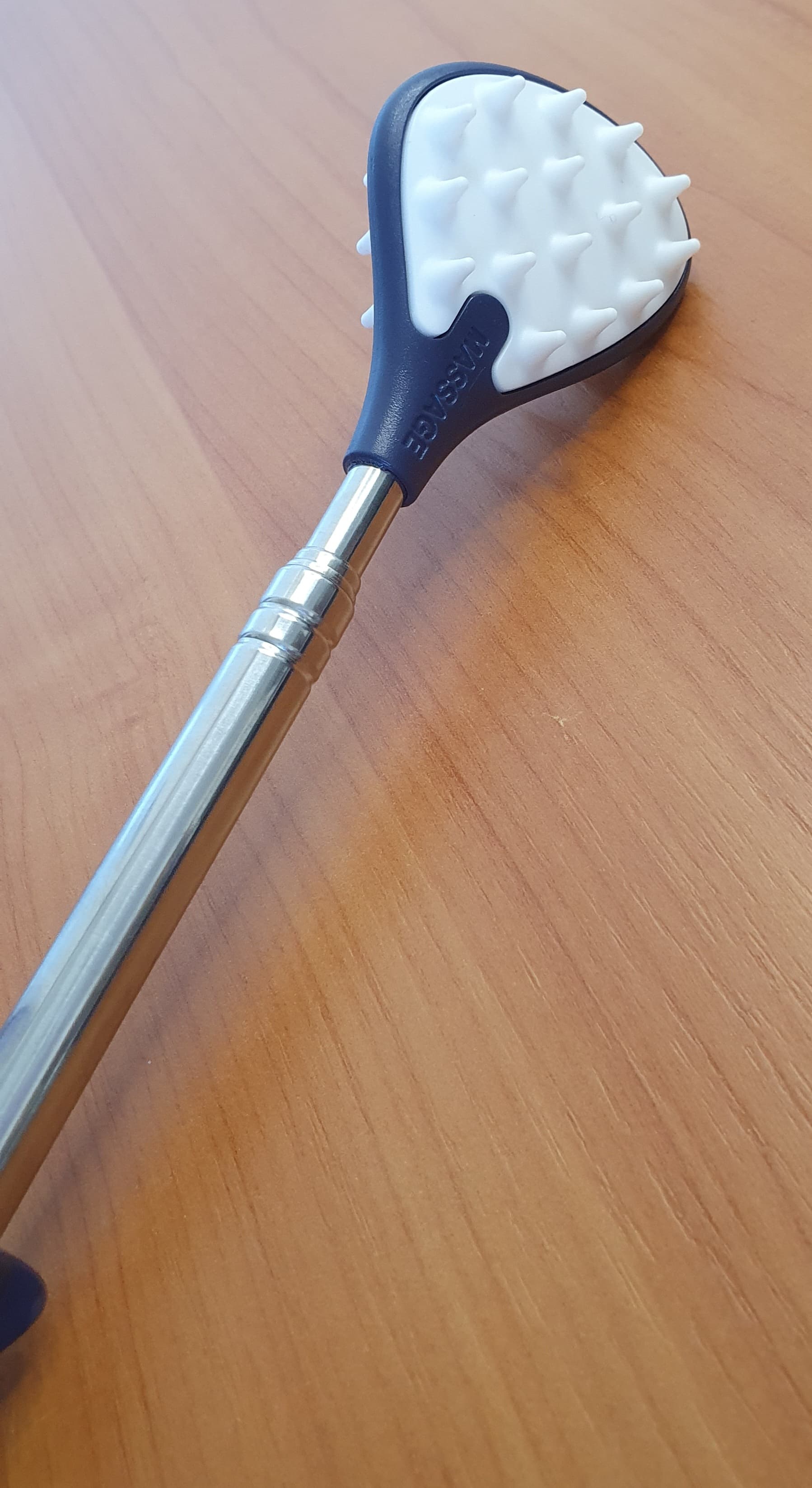 Teleskopowy drapak do pleców